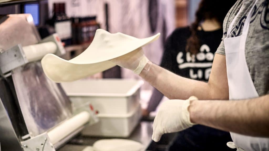 Making pizza bases in our Melbourne restaurant