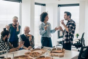 Corporate catering - Customers enjoying Pizza