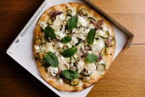 Ricotta Pizza - Mozzarella / Fresh Ricotta / Zucchini / Mint / Caramelised Onions / Shaved Parmesan / Provolone