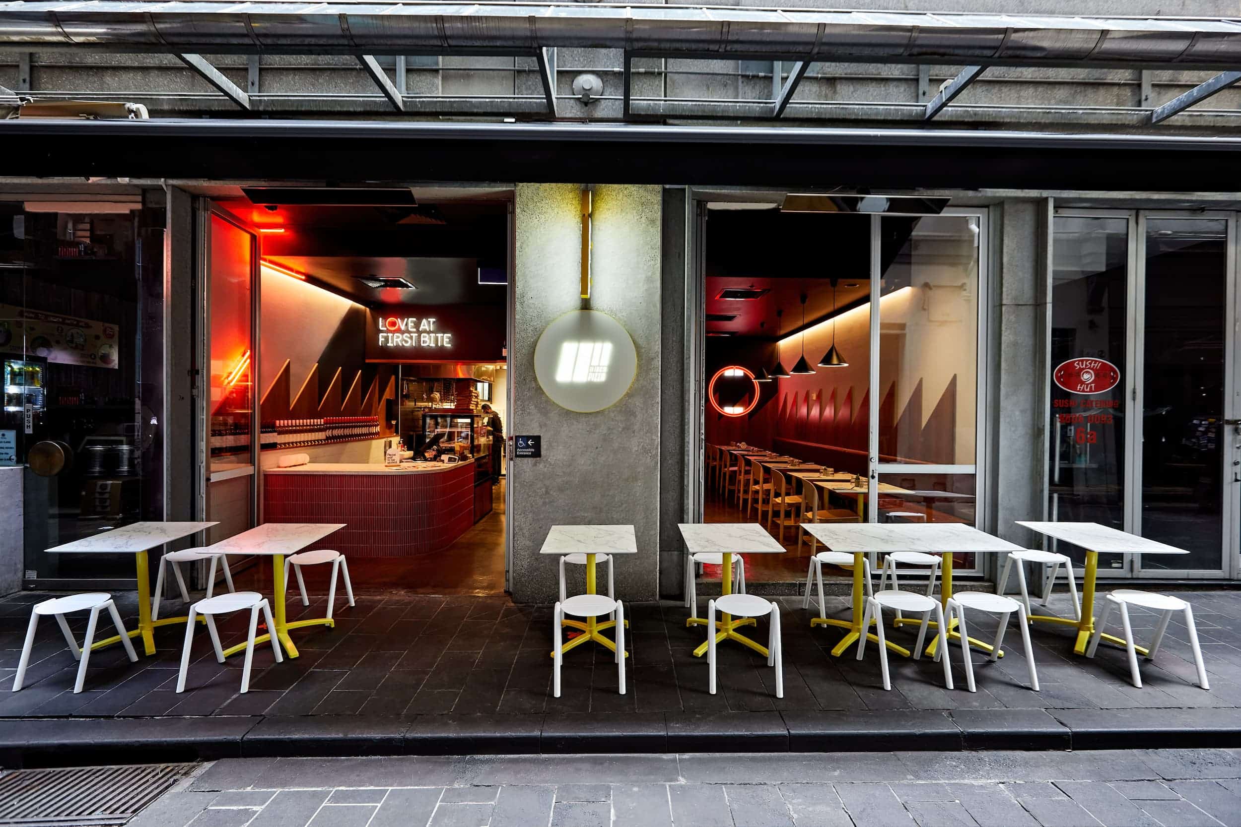 Exterior seating area at 11 Inch Pizza restaurant on Little Collins Street, Melbourne.